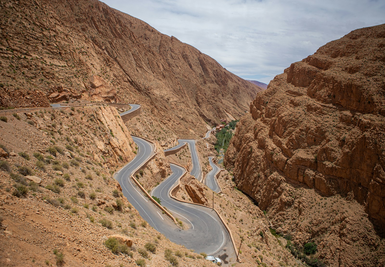 A winding road in the middle of a desert